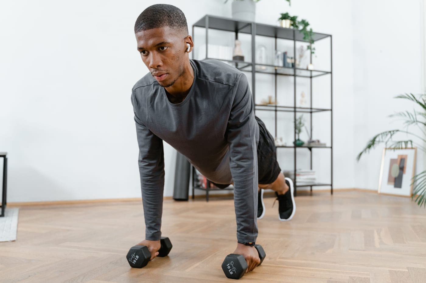 A beginner setting up home gym equipment